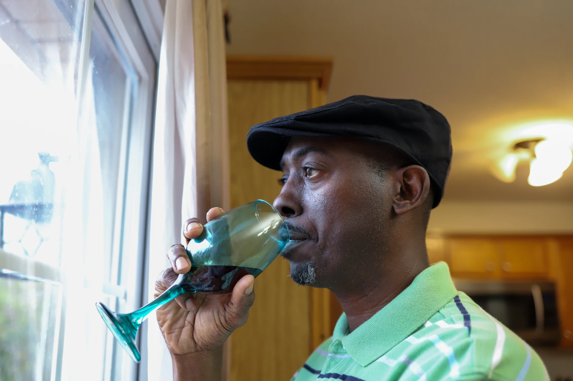 Am I an alcoholic signs of a drinking problem Person reflecting on their drinking while considering whether they have an alcohol use disorder