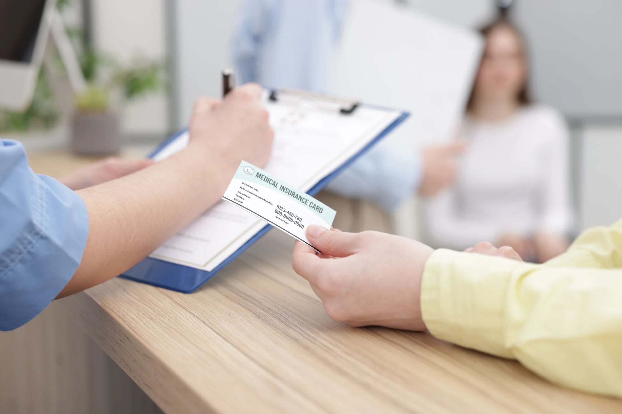 Person holding an Aetna insurance card while verifying rehab benefits