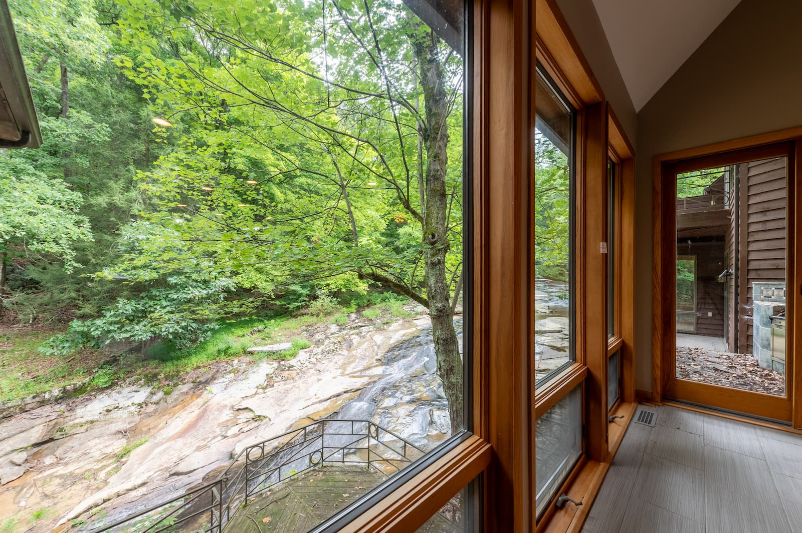 A peaceful, retreat-like view of a brook running alongside Wise Path Recovery