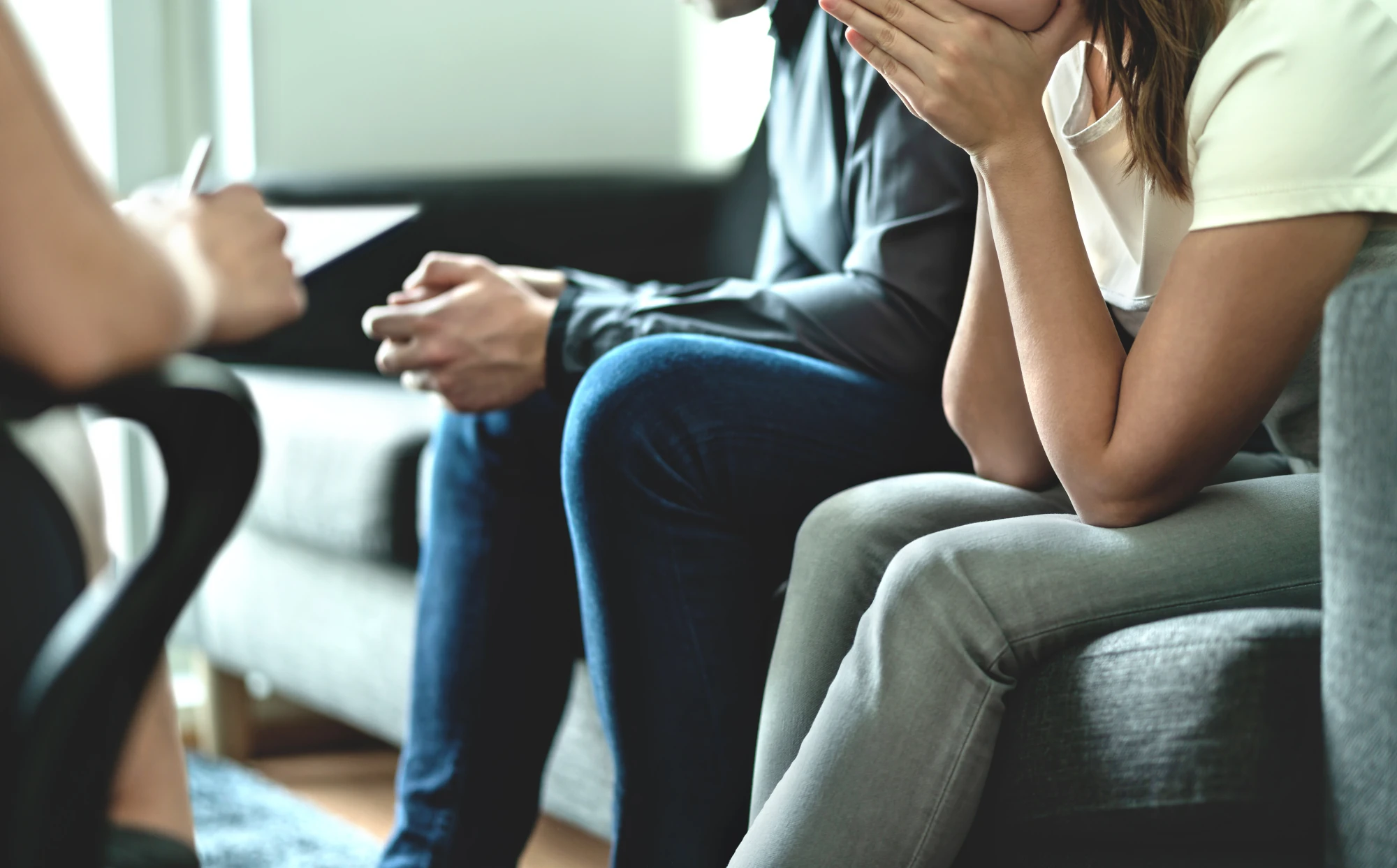 Counselor talking with a family about how to help an addict.