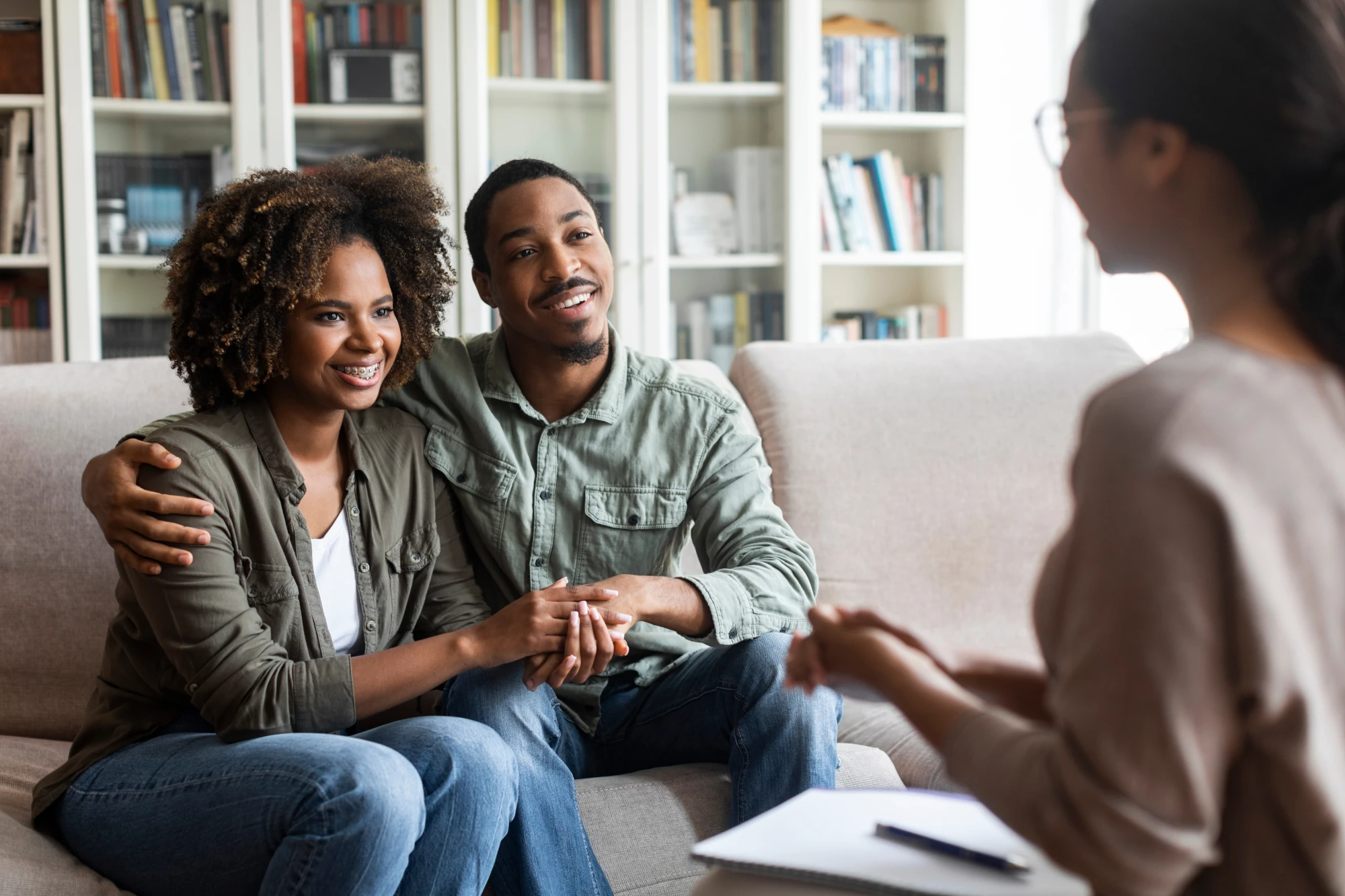 Family discussing how to stage an intervention for a loved one.