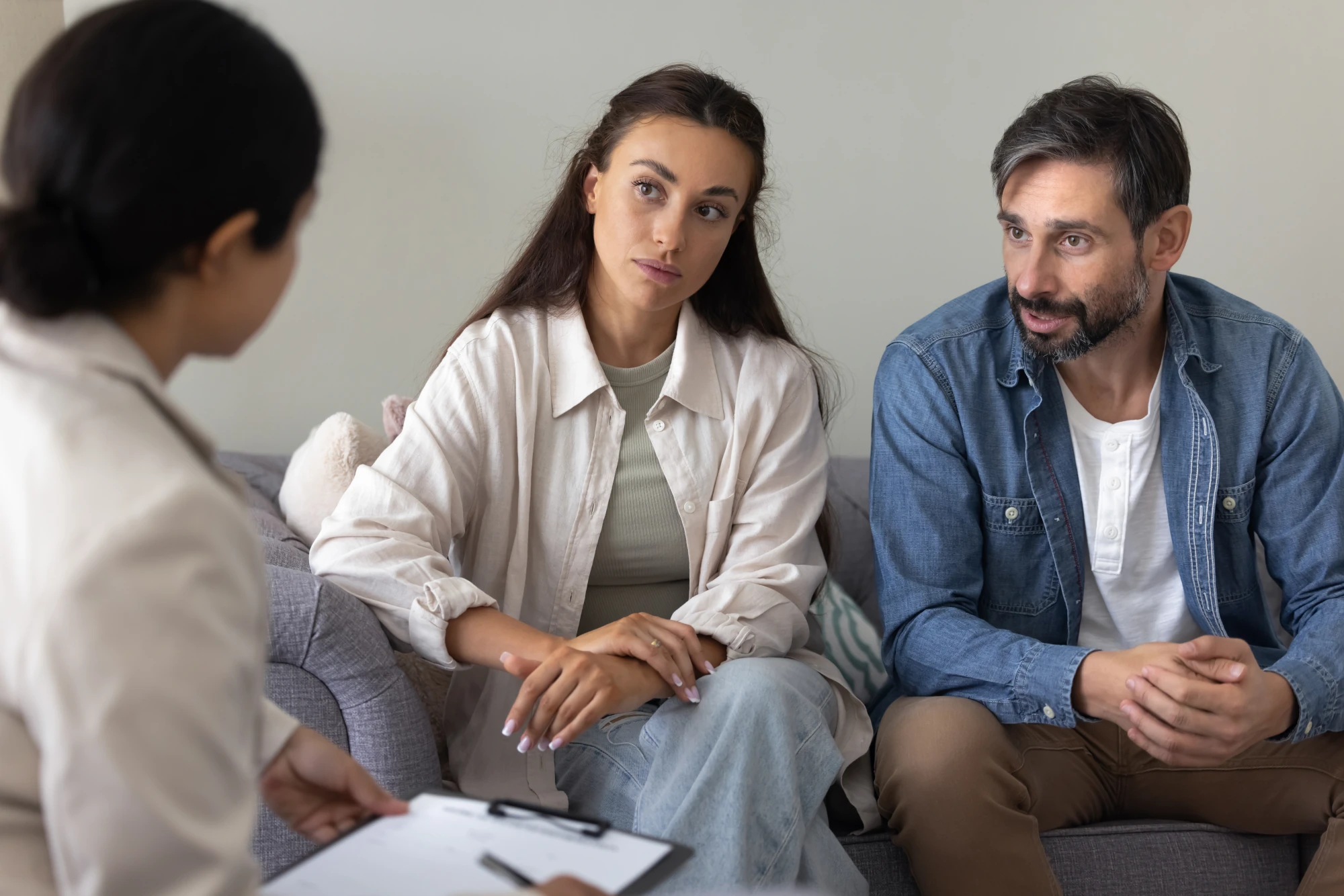 Family discussing why their teen is using drugs and how to respond.